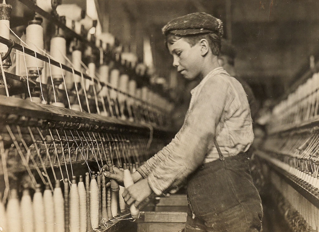 LEWIS W. HINE (1874-1940) Doffer Boy in Georgia cotton mill.